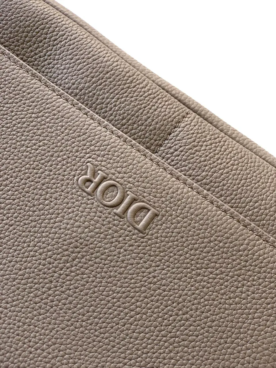 View 5 of Pebble Leather Crossbody: Subtle Branding, Quiet Luxury
