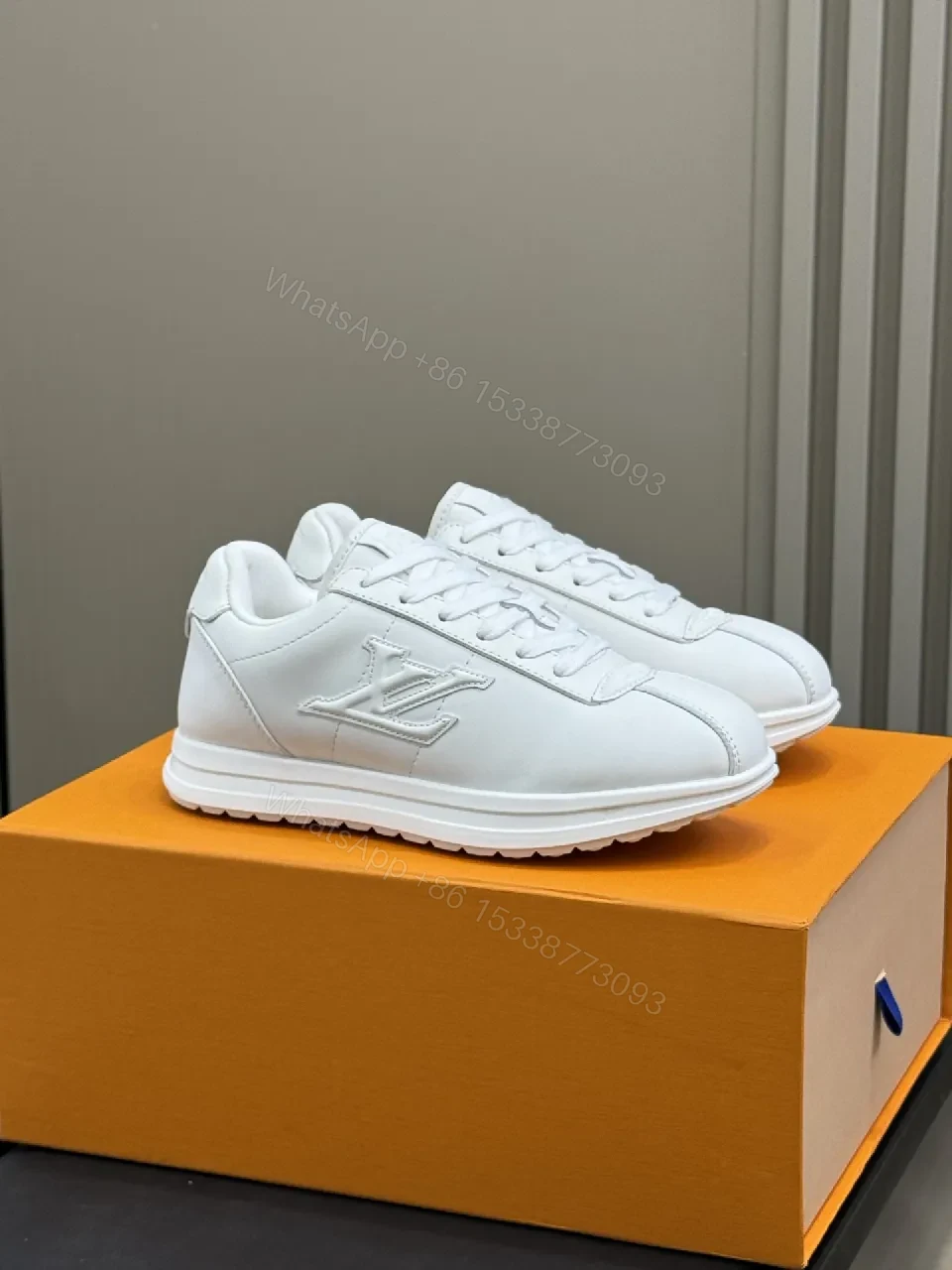 White Leather Minimalist Sneakers with Couture Stitching — view 1