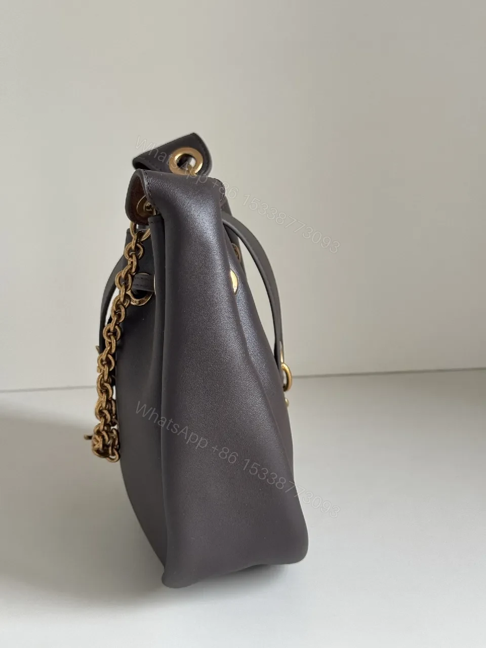 View 6 of Deep Black + Leather + Minimalist + Gold Hardware + Bucket Bag