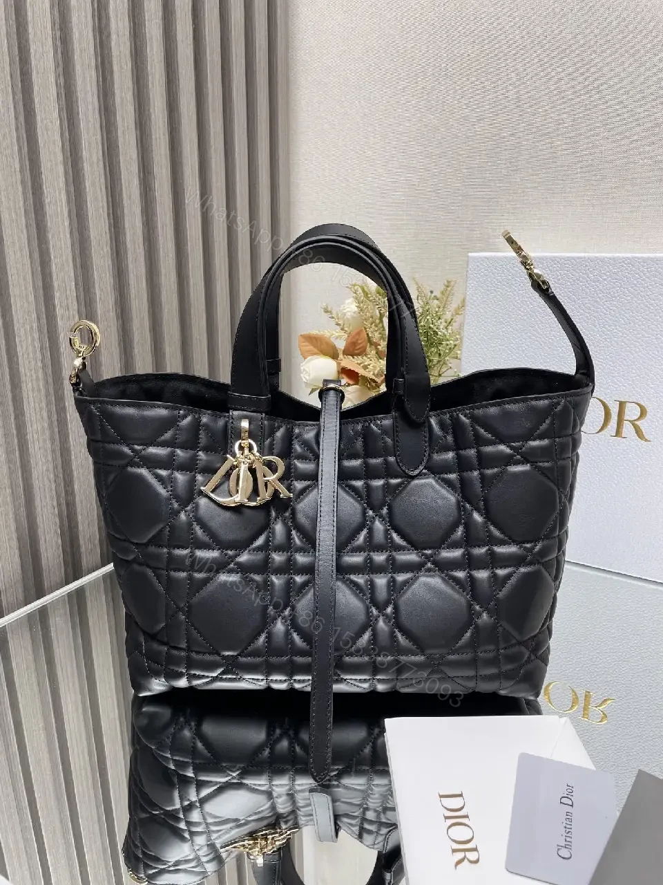 View 3 of Black Quilted Tote with Gold Charm – Luxury Everyday Bag