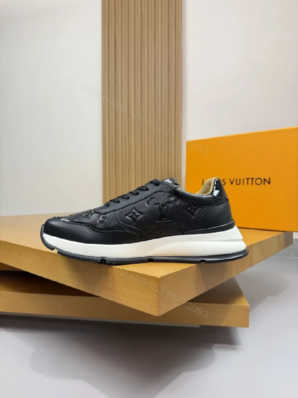 View 2 of Black Leather Trainer with Subtle Monogram Detailing - Everyday Luxe Comfort