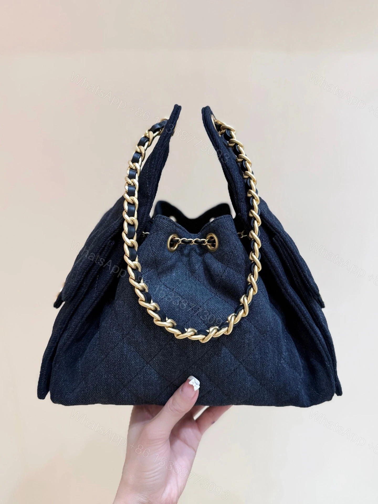 View 6 of CHANEL 25 HANDBAG 30 IN DARK BLUE DENIM GOLD HARDWARE