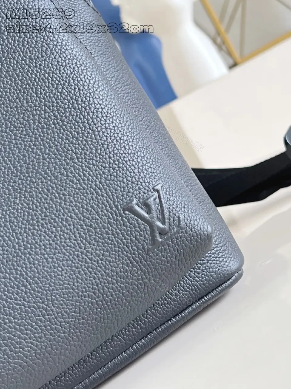 View 5 of Gray Leather Compact Backpack: Minimalist Luxury, Subtle Branding, Everyday Organizer