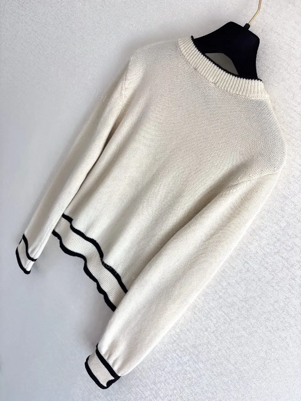View 6 of Cream Knit Cardigan: Clean Lines, Subtle Contrast, Everyday Luxury