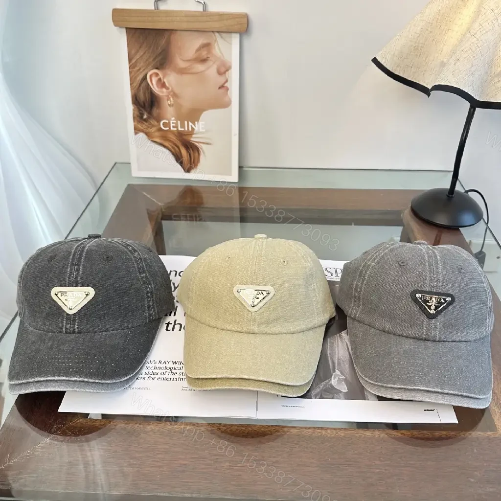 View 2 of Washed Dark Gray Denim Cap, Curved Brim, Distressed Texture, Prada Patch