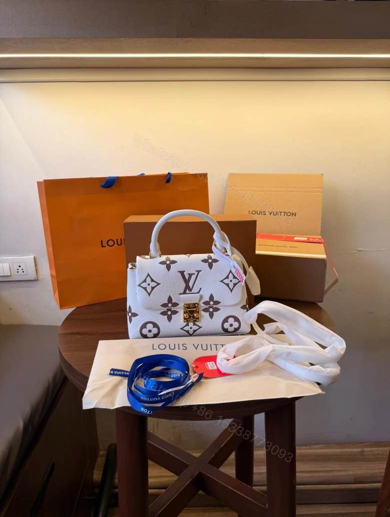 FIRST COPY LOUIS VUITTON MADELEINE MM BICOLOR HANDBAG — view 1
