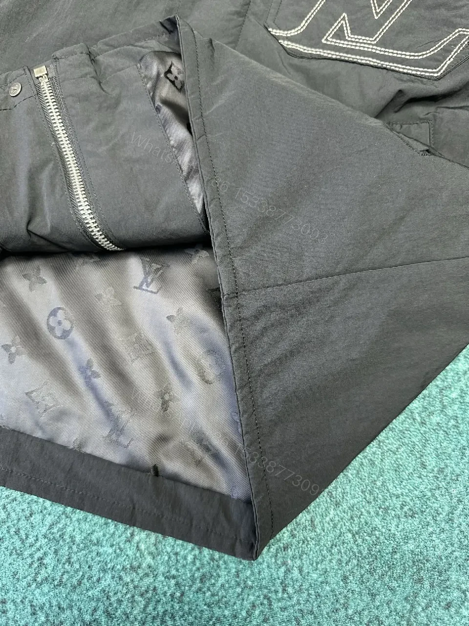 View 5 of Dark Matte Jacket with Signature LV Stitch Pocket - Modern Minimalist Jacket