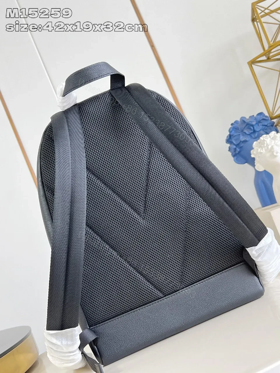 View 2 of Gray Leather Compact Backpack: Minimalist Luxury, Subtle Branding, Everyday Organizer