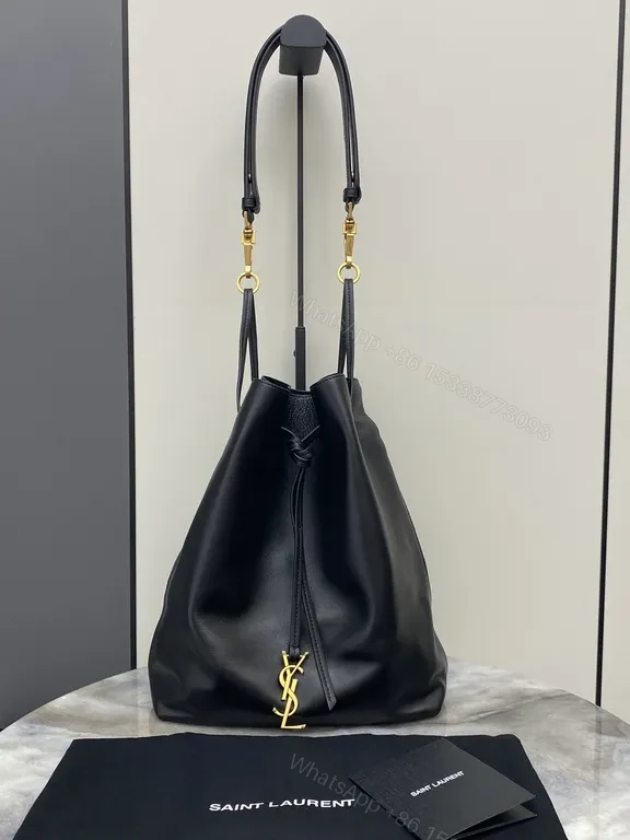 Minimalist Black Leather Drawstring Bucket Bag with Gold Hardware — view 1