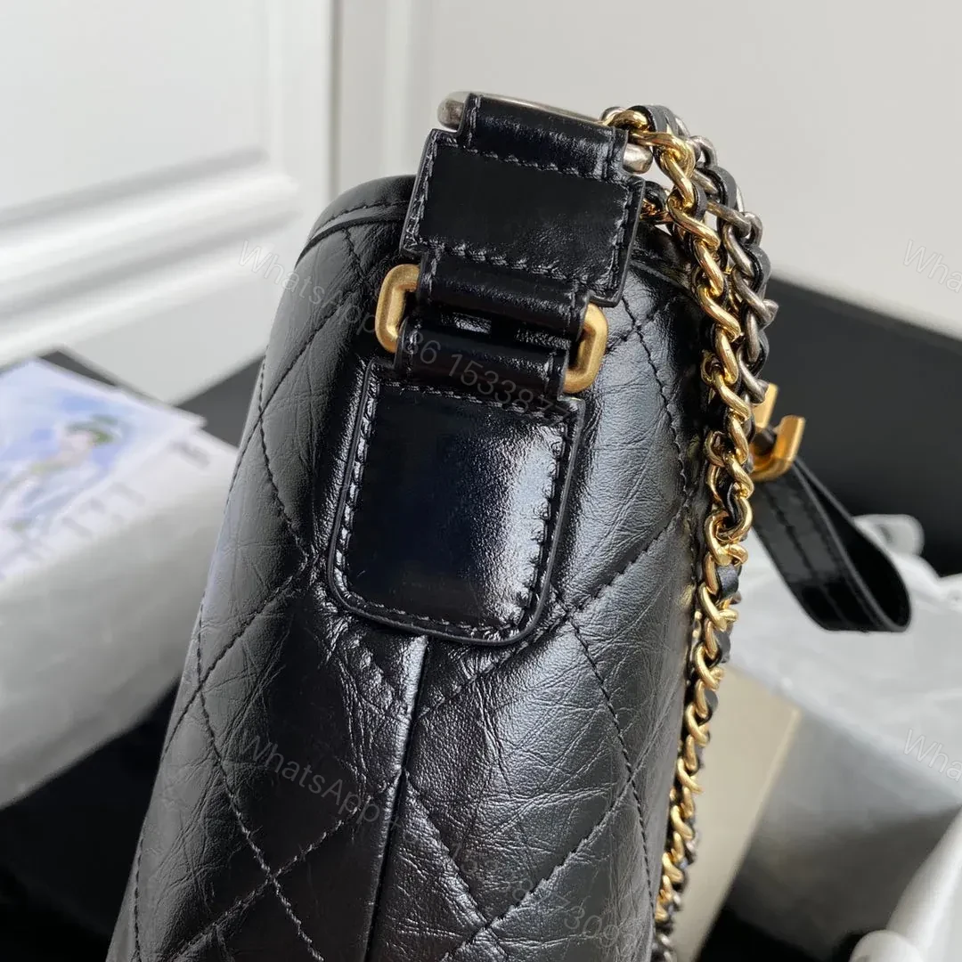 View 2 of CHANEL GABRIELLE MEDIUM 28 HOBO BAG IN BLACK CALFSKIN
