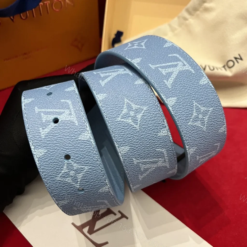 View 2 of Soft-Blue Monogram Belt: Textured Leather, Modern Silhouette, Everyday Luxury