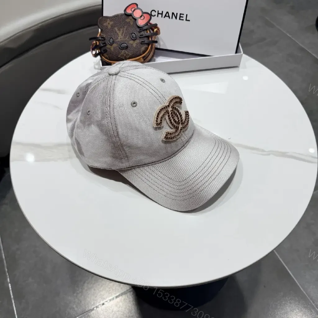 View 9 of Casual Luxe Cap: Subtle Denim, Interlock Emblem, Adjustable Strap