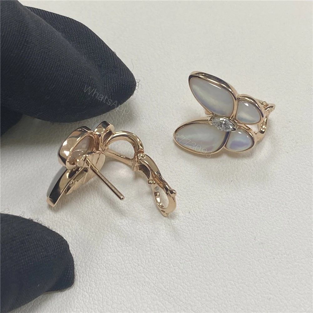 View 7 of Van Cleef & Arpels Two Butterfly Mother Of Pearl And Diamond Earrings VCARO8FN00