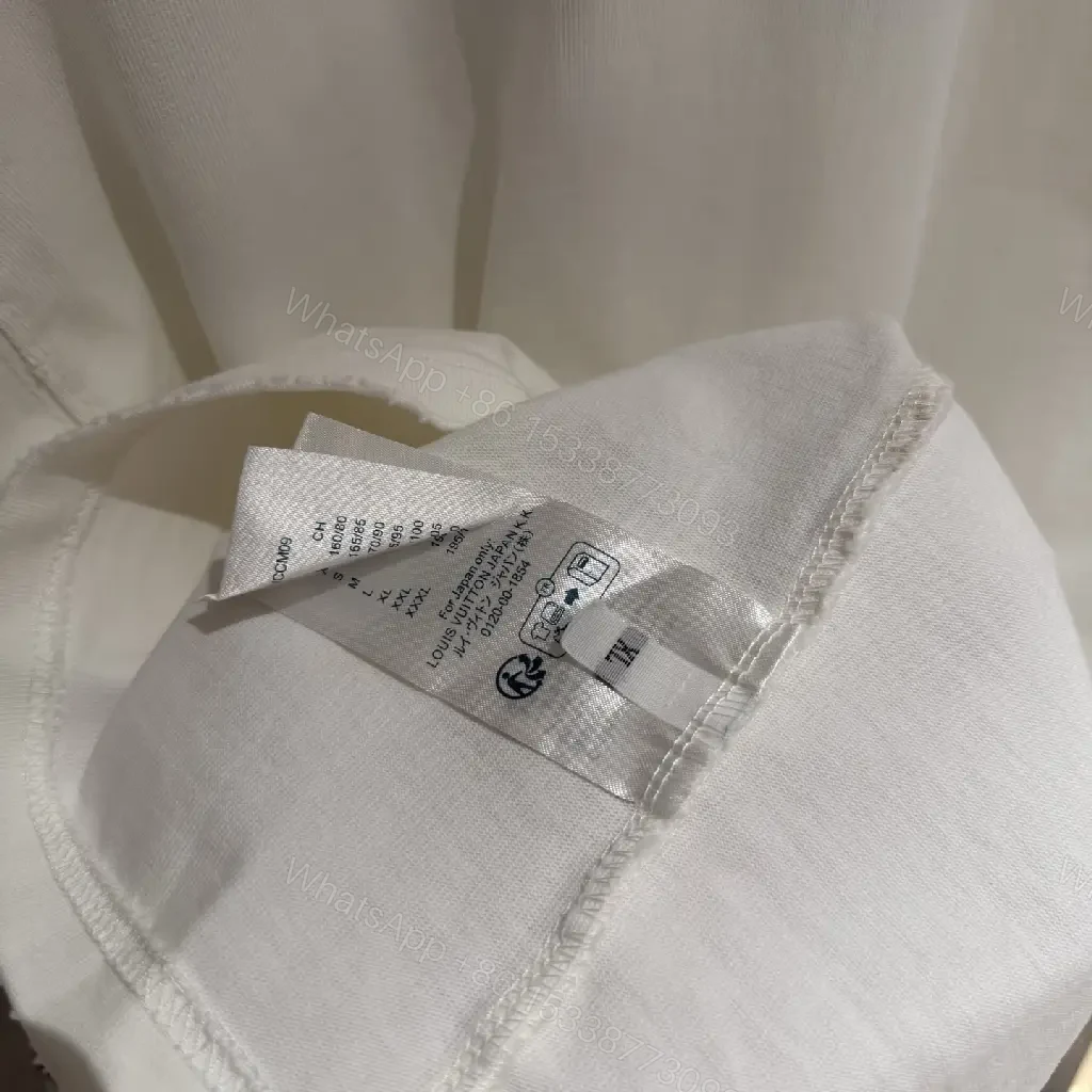 View 8 of White Cotton-Blend Pullover with LV Logo & Architectural Sleeves