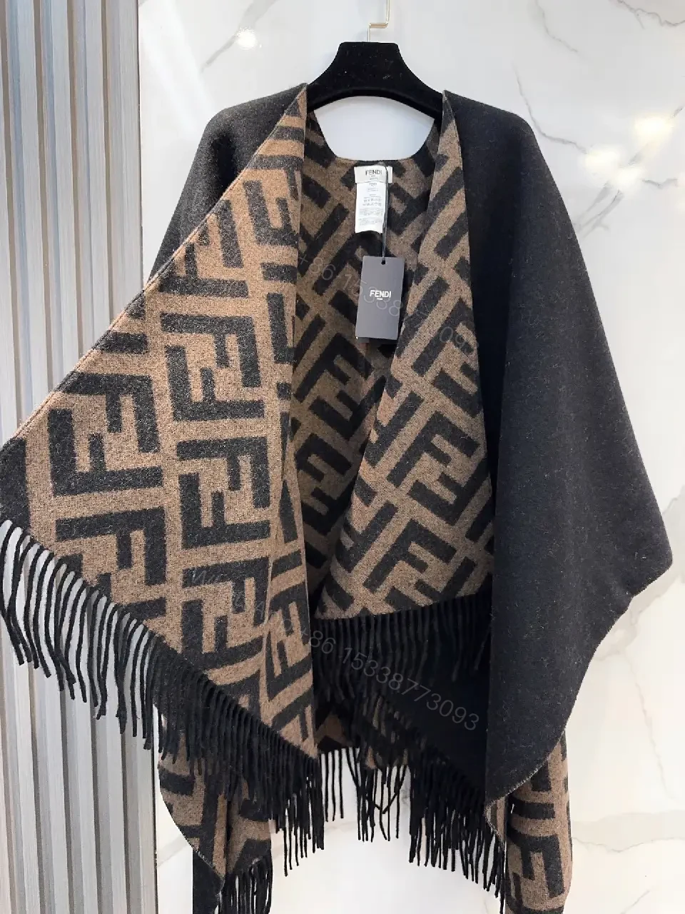 View 7 of Chic Monogram Wool Poncho with Fringe Details