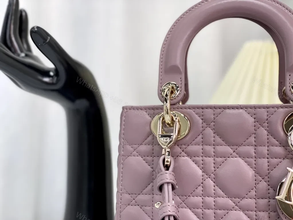 View 5 of Chic Quilted Mini Satchel with Gold Charms - All-Day Versatility