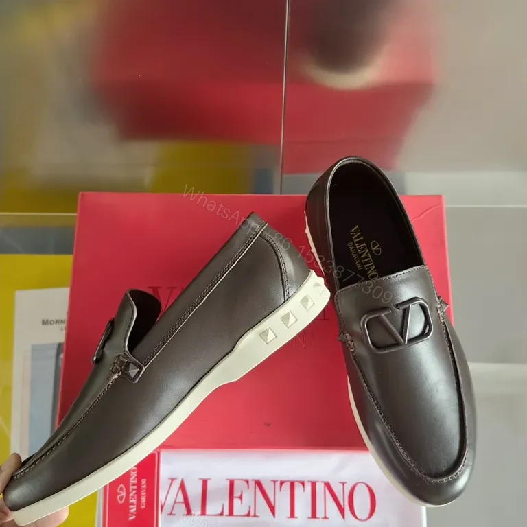 View 8 of Sleek Leather Loafers with Signature Hardware, Black, Luxury Style