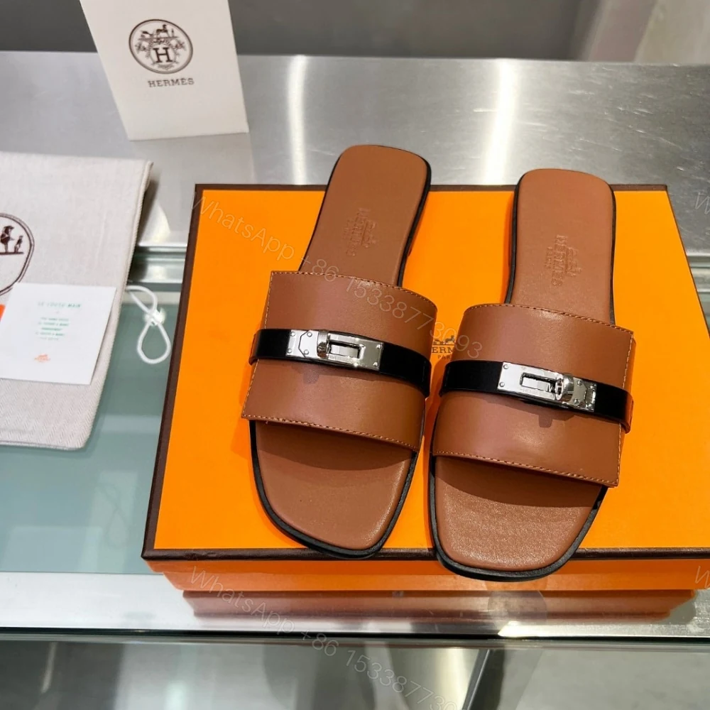 View 4 of HERMES GIULIA SANDAL GOLD AND NOIR H231056Z 20360