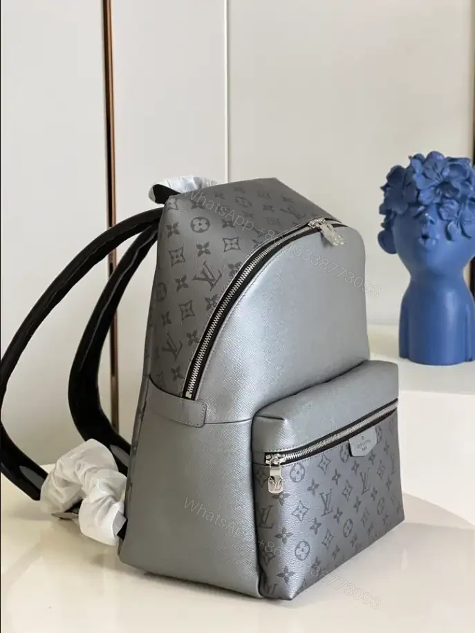 View 4 of LOUIS VUITTON DISCOVERY BACKPACK PM TAIGARAMA – LBV387