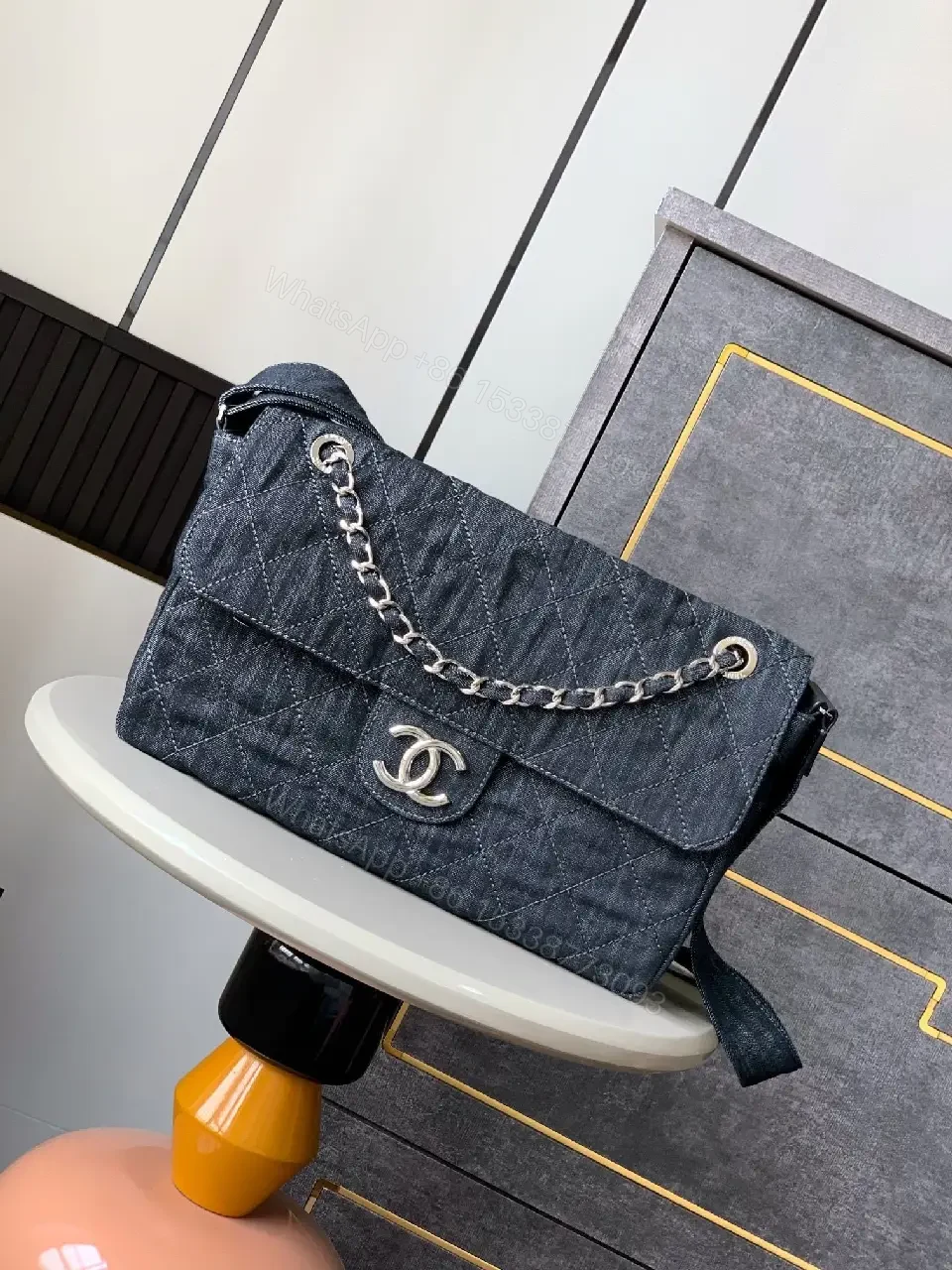View 8 of Denim Quilted Flap Bag with Signature Chain Closure