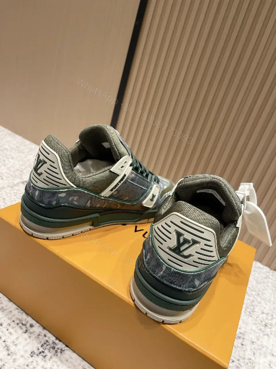 View 8 of Denim Textured Sneaker with LV Detailing, Modern Couture Outdoors