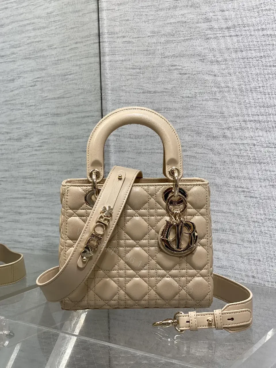View 6 of Beige Quilted Leather Handbag with Top Handle for Everyday Luxury