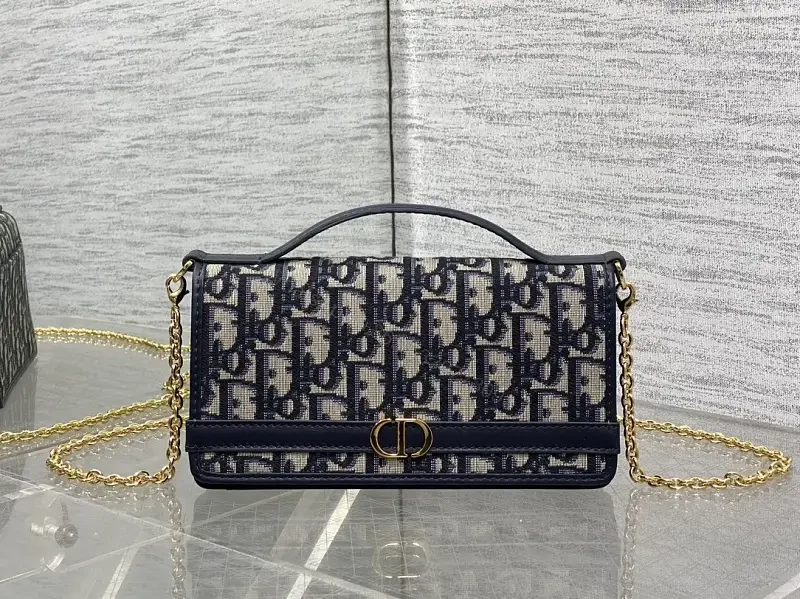 Navy monogram canvas leather-trim shoulder bag for everyday luxury — view 1