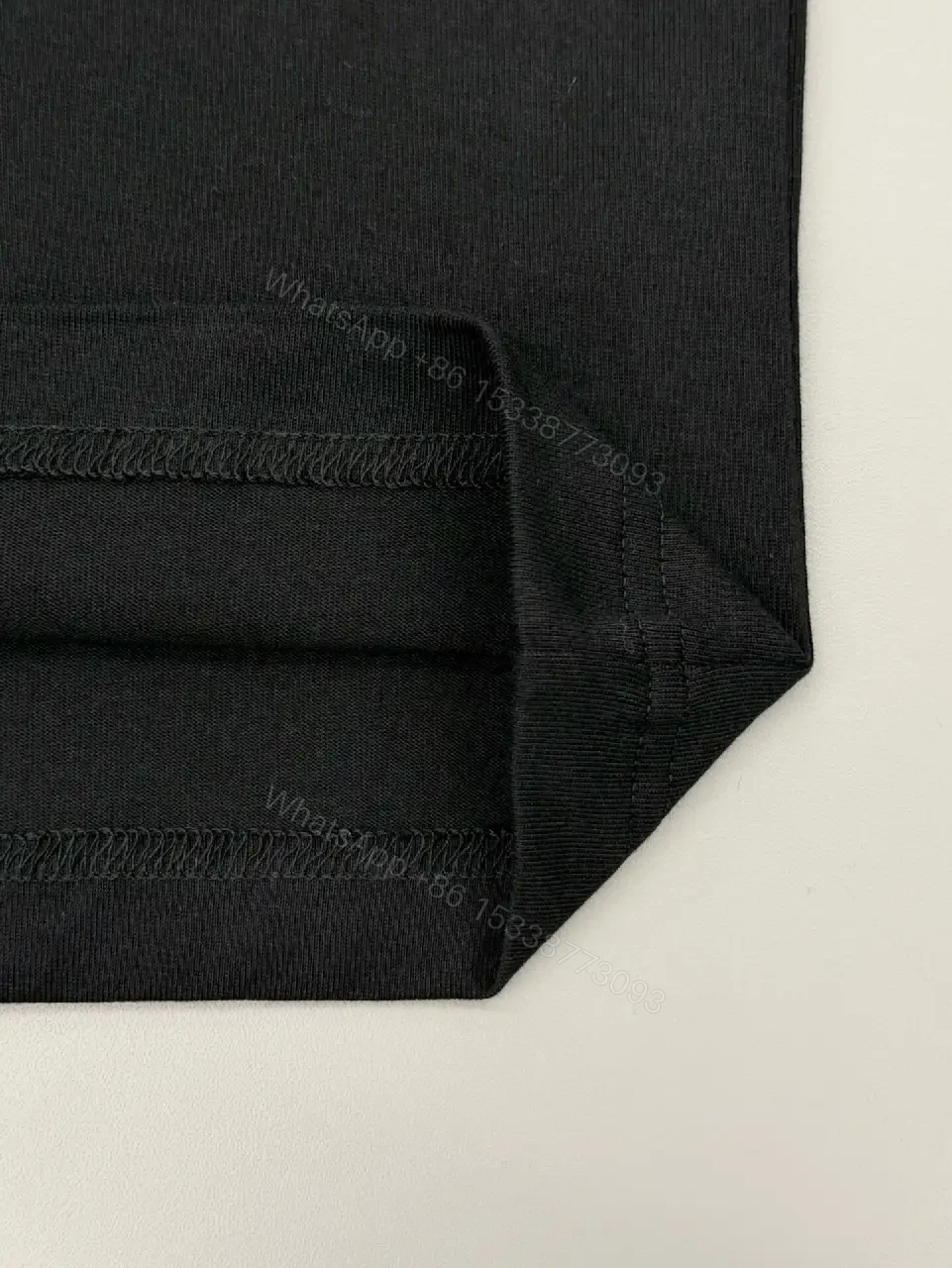 View 5 of Bold Black Cotton Tee: Subtle Luxe Dior Graphic