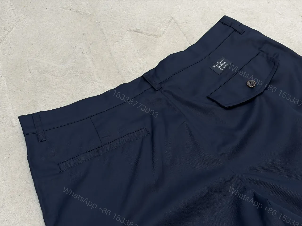 View 2 of Navy Cargo Shorts with Louis Vuitton Logo Embossed Key Features Short