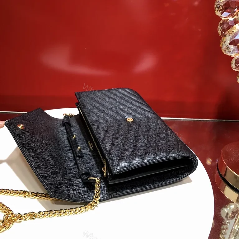 View 2 of Black Leather Chevron Clutch with Gold YSL Emblem - Luxury Evening Bag