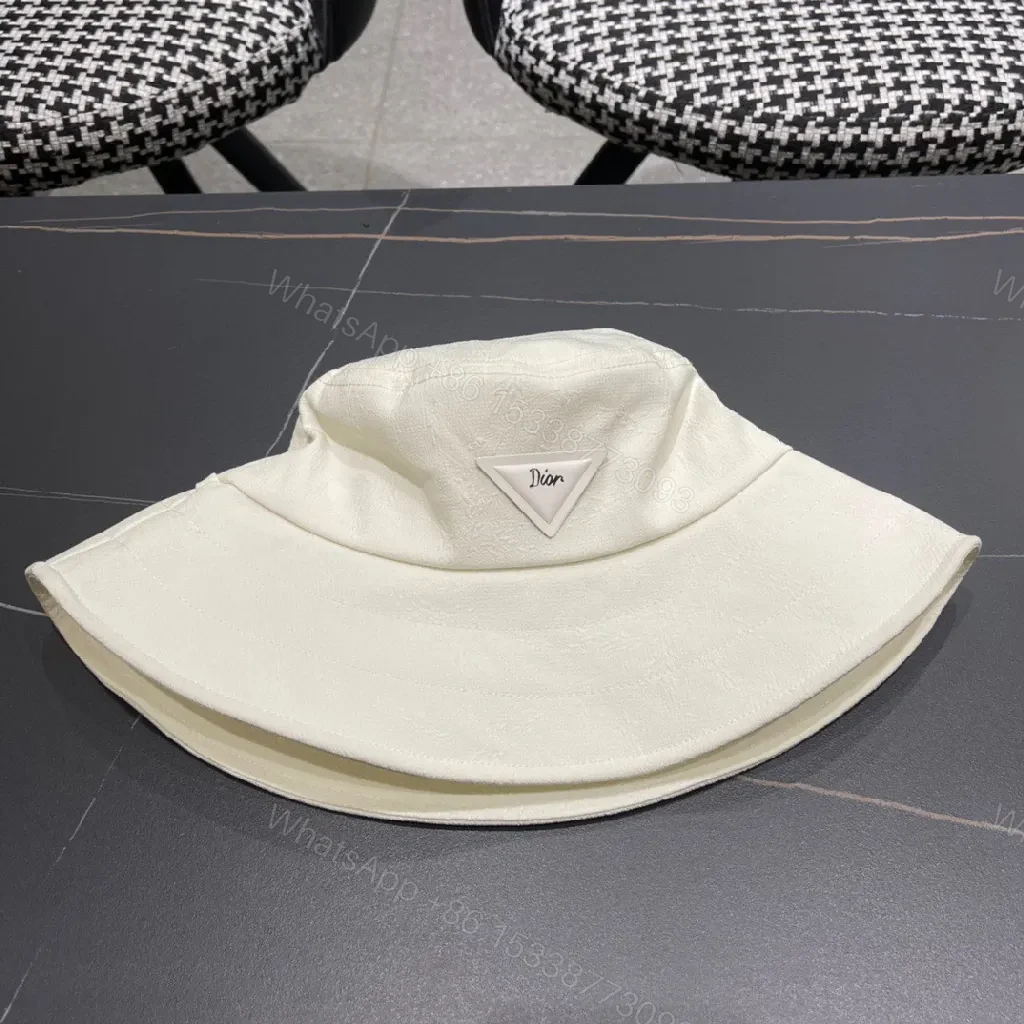 View 6 of Compact Luxury Bucket Hat with TriangleEmblem, Off-White, Textured Weave