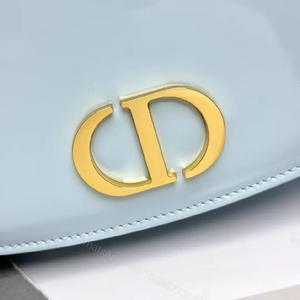 View 5 of Soft Sky Blue Mini Bag with Gold Hardware Logo Accent Bag
