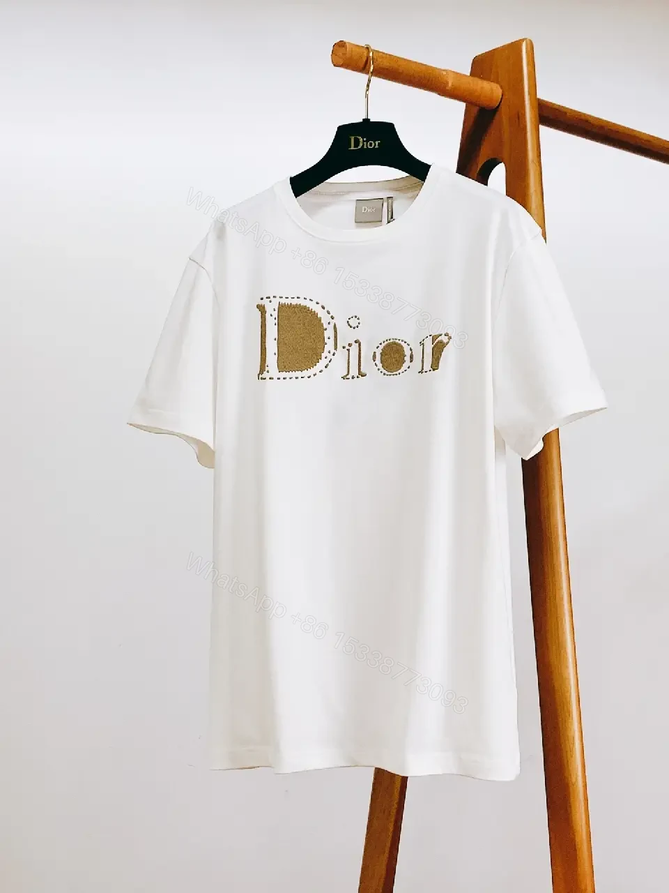 View 10 of White Cotton Tee + Subtle Logo Embellishment + Luxe Casual + Elevated Detail + T-Shirt