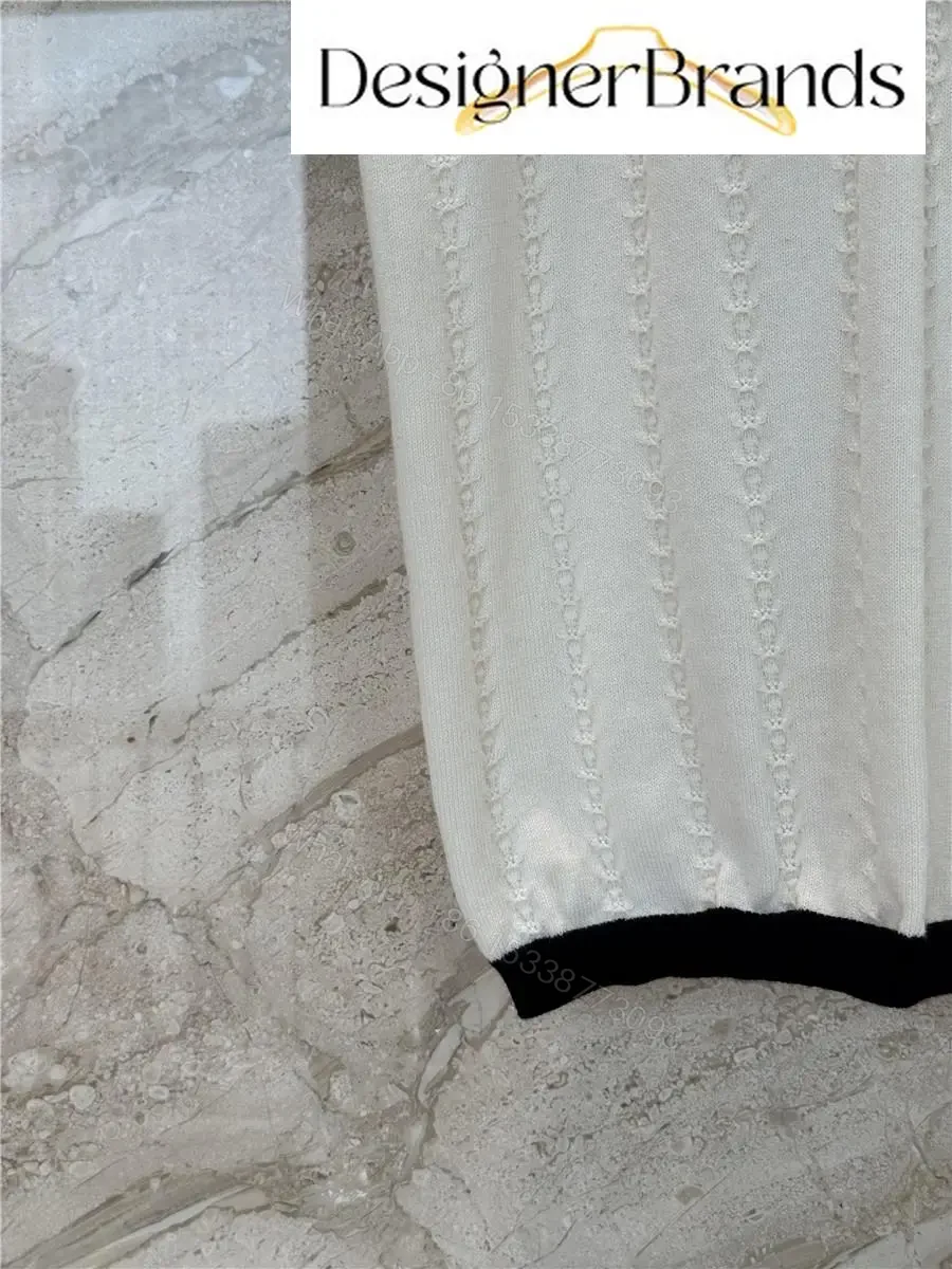 View 5 of White Knit Tank: Black Trim, Vertical Rib, Sleek Silhouette, Sleeveless Top