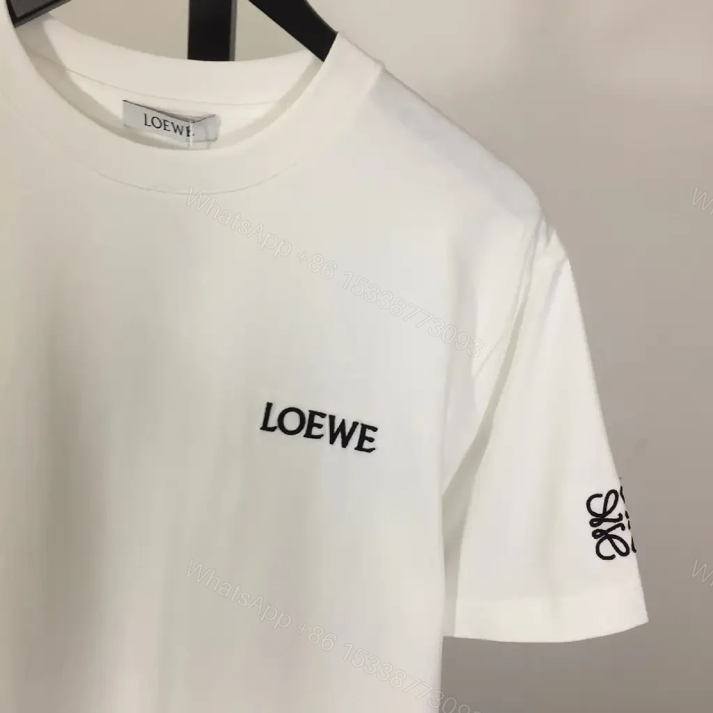 View 5 of Minimalist White Tee with Signature Accents—Premium Cotton-jersey Tee