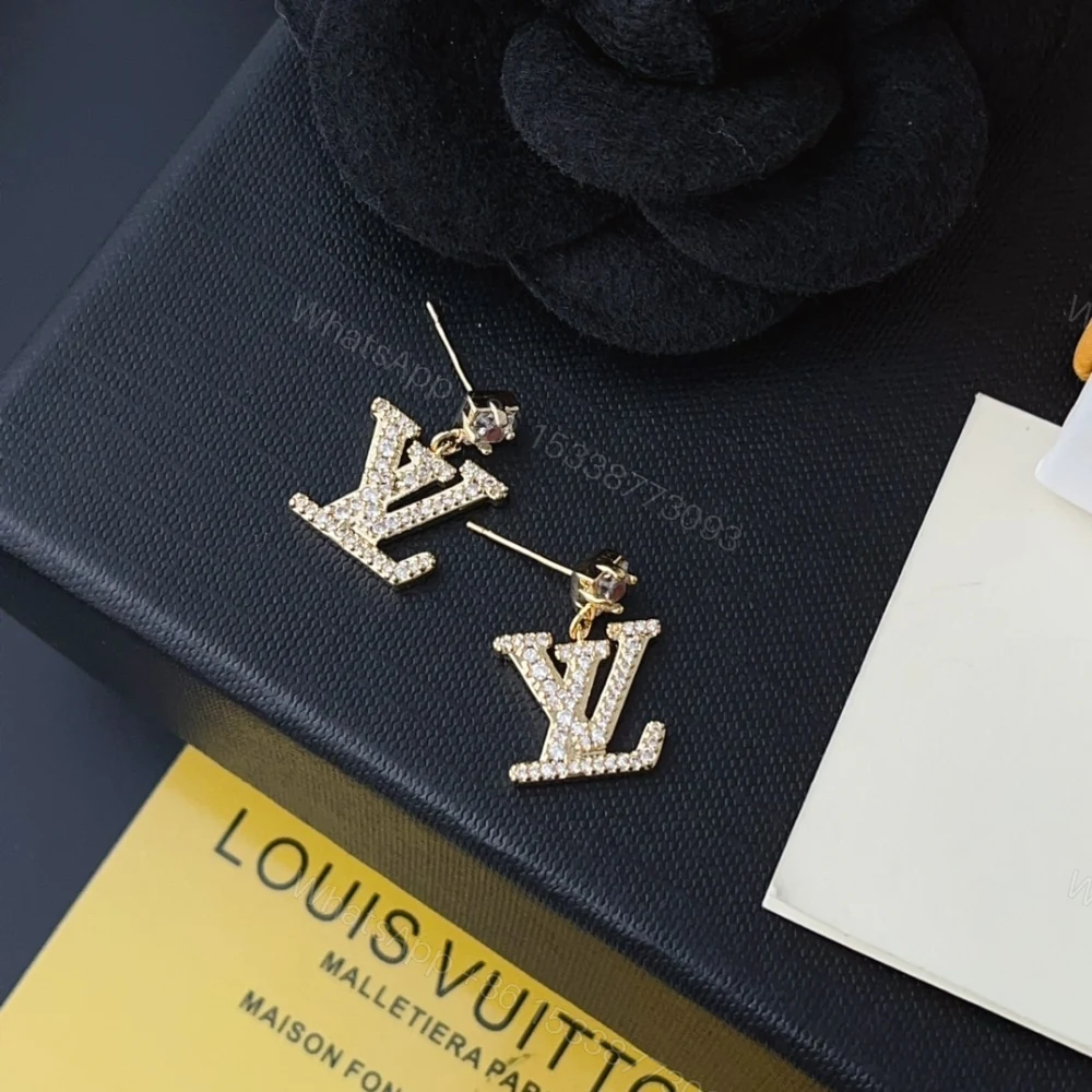 View 4 of LOUIS VUITTON LADY LV EARRINGS GOLD TONE M01844
