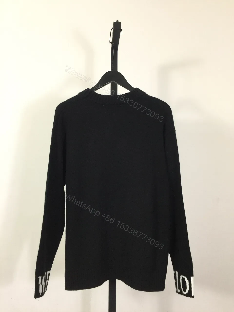 View 3 of Monochrome Black Knit — refined edge, premium warmth
