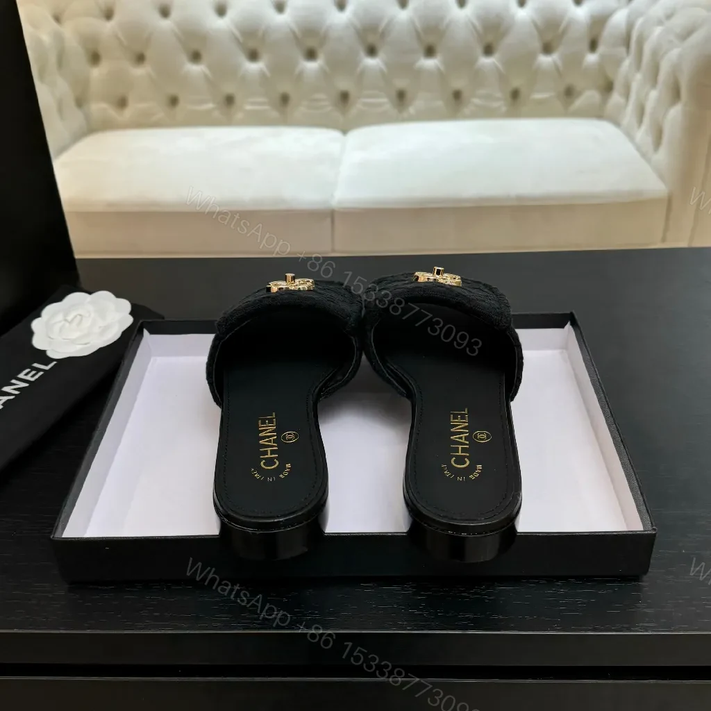View 5 of Quilted Black Slip-Ons with Gold Logo – Luxury Comfort