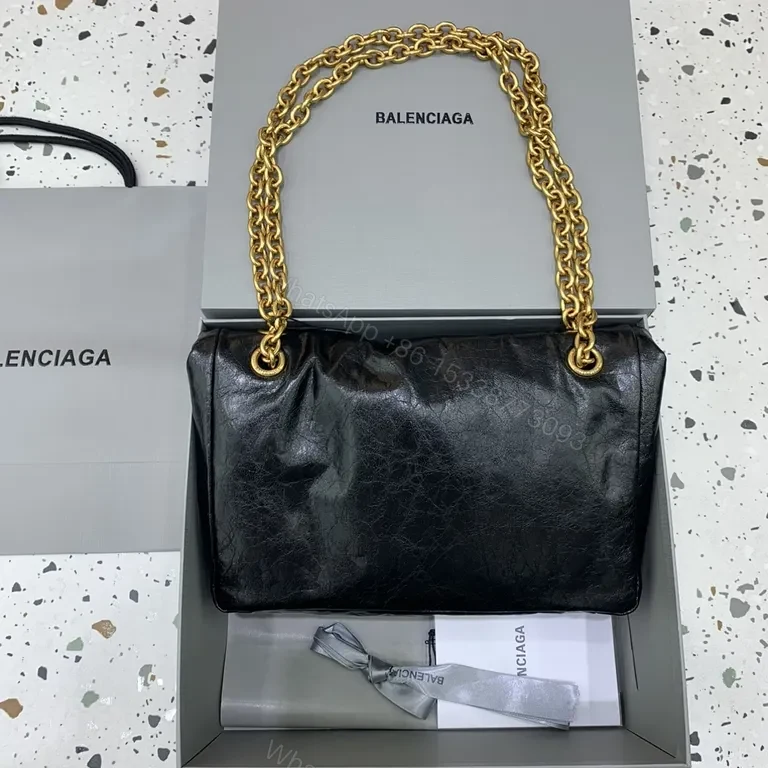 View 8 of Chic Black Leather Shoulder Bag with Gold Chain Straps