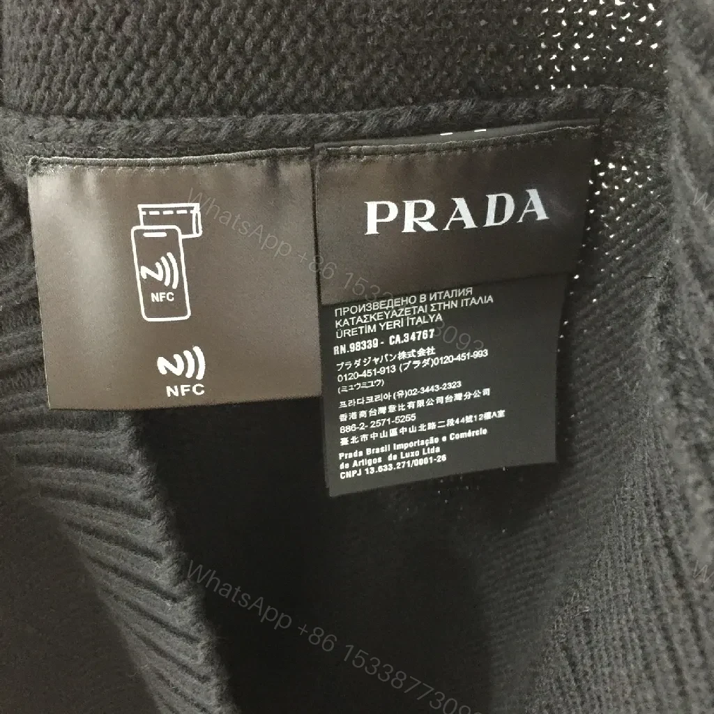 View 6 of Leather-Feel Knit Crewneck with Crest: Subtle Luxury Comfort