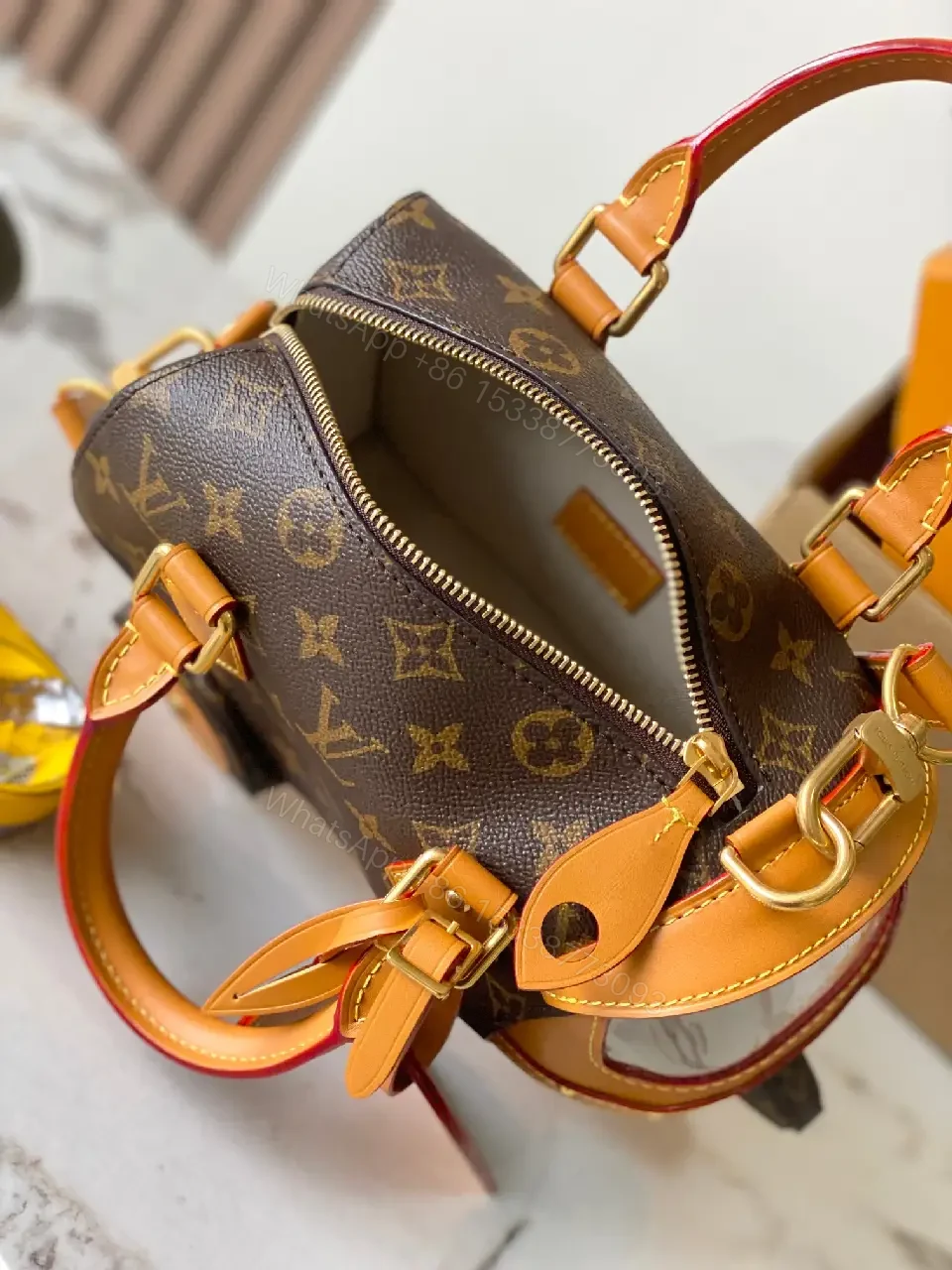 View 3 of Dark Brown LV Monogram Mini Luggage Bag on Wheels