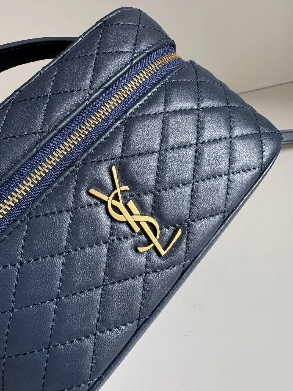 View 8 of Navy Quilted Leather Crossbody Bag with Gold Hardware