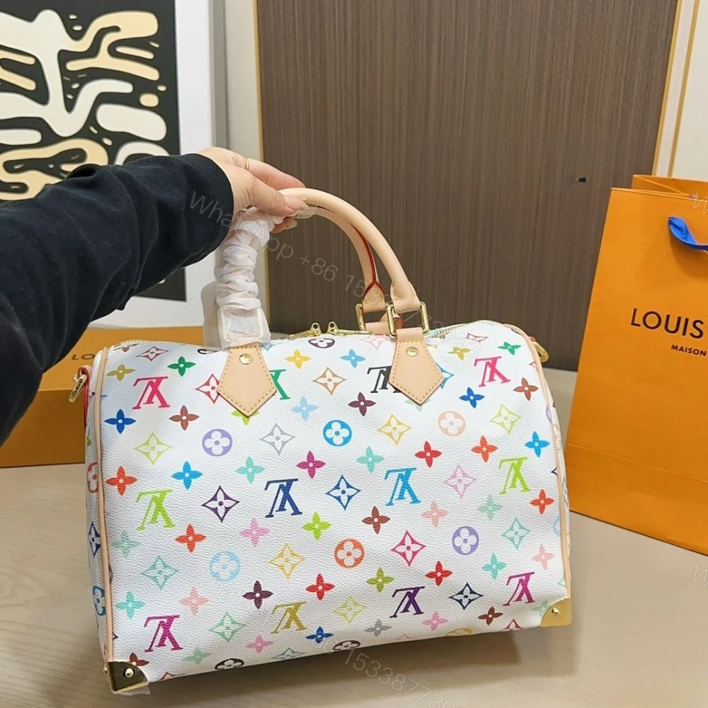 View 6 of Louis Vuitton TM Speedy Soft 30 Multicolor White 30Cm M27789