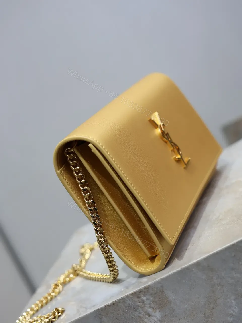 View 5 of Gold-Tone Leather Clutch Wallet with YSL Hardware
