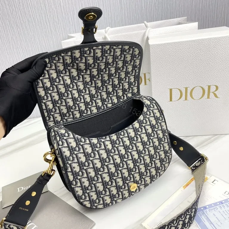 View 2 of Dior Oblique Mini Saddle Bag â€“ Gold Hardware, Leather Trim, Crossbody