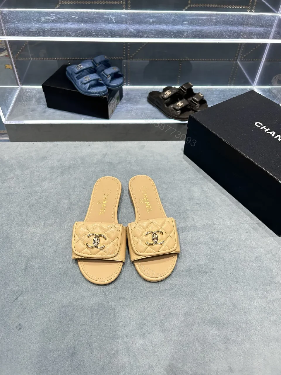 View 2 of Beige Quilted Leather Slide Sandals with Logo Detailing
