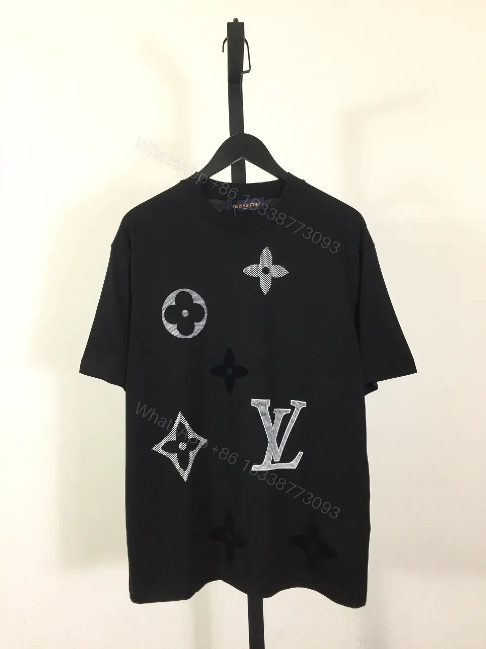 Oversized Black Graphic Tee with LV-Inspired Monograms and Detail — view 1