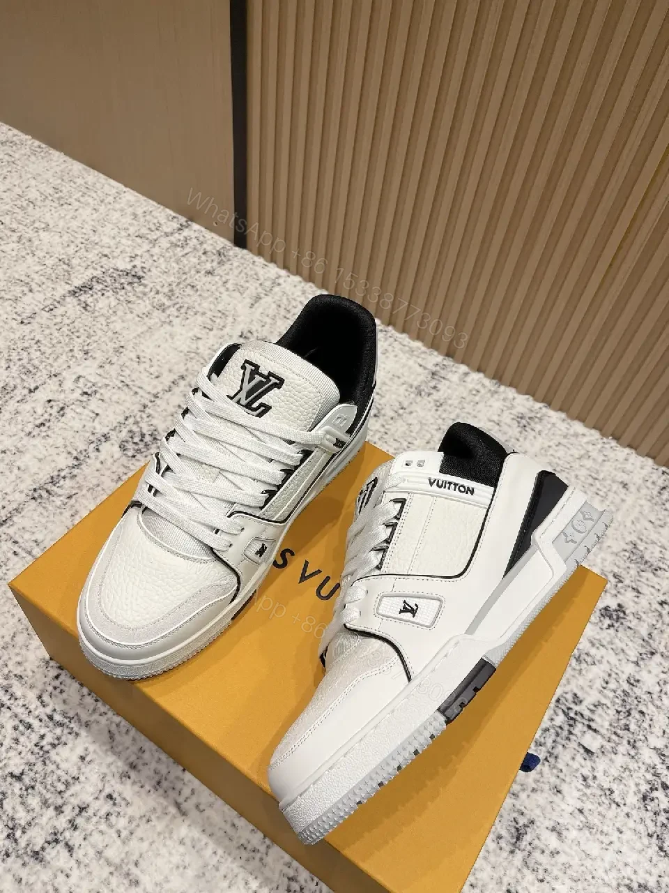 View 4 of White Leather Runner Sneakers with LV Detailing