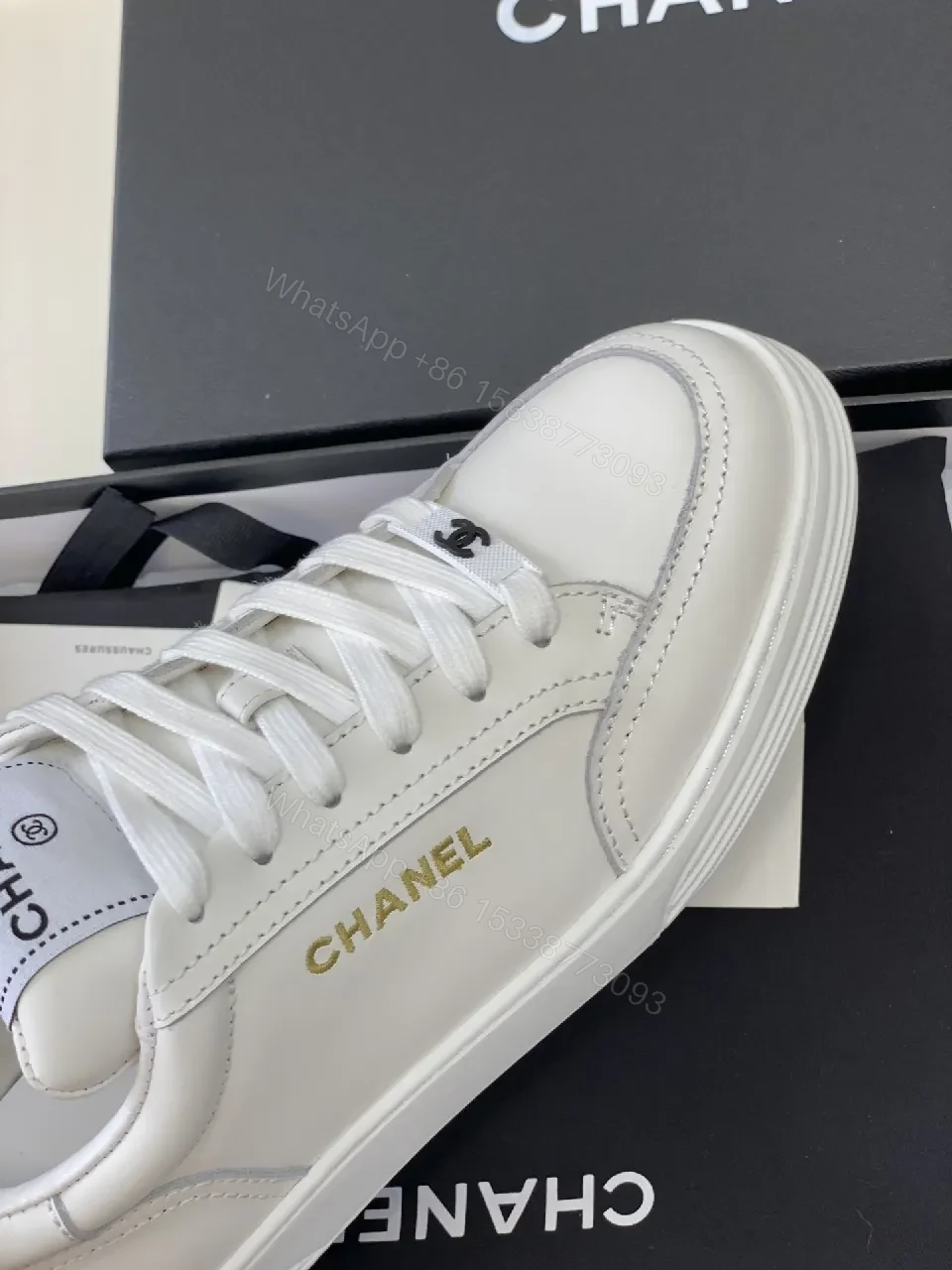 View 2 of White Leather Sneakers: Minimalist High-Tops with Gold Logo