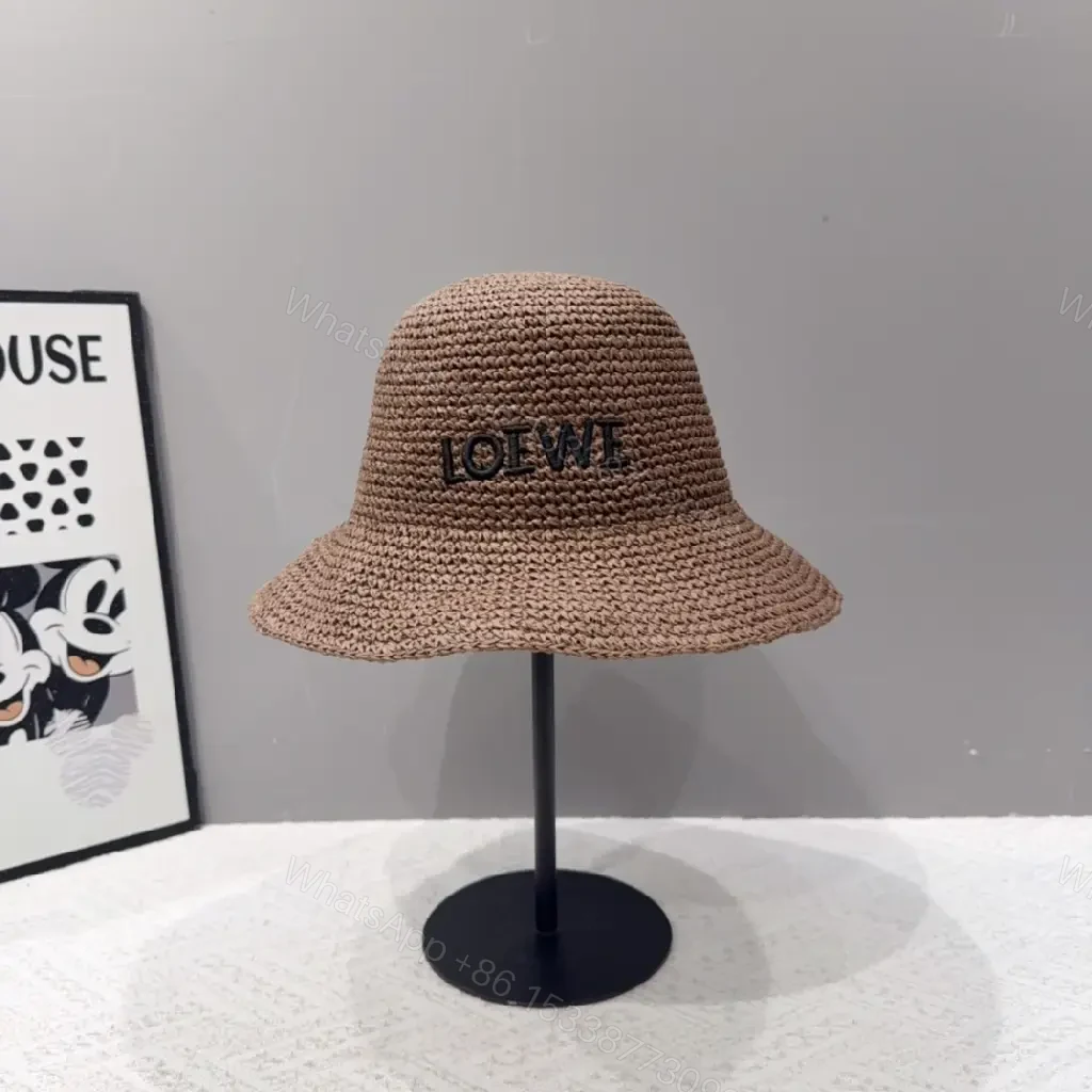 View 3 of Natural Straw Bucket Hat with LOEWE Embroidery